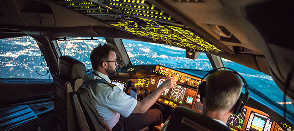 Plance cockpit with two pilots - showing a typical case where you would find a small vaneaxial fan